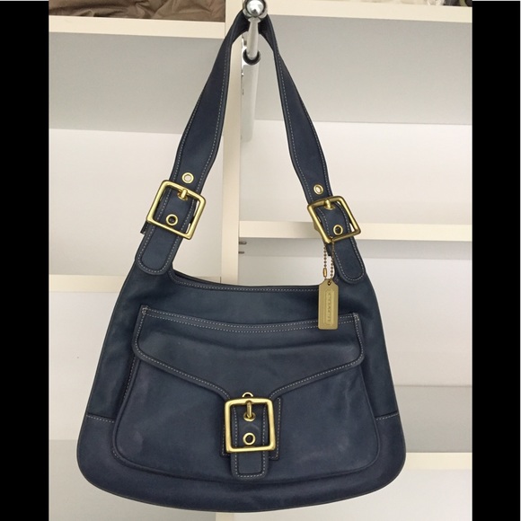 Coach Handbags - Classic Coach blue saddle bag with gold accents